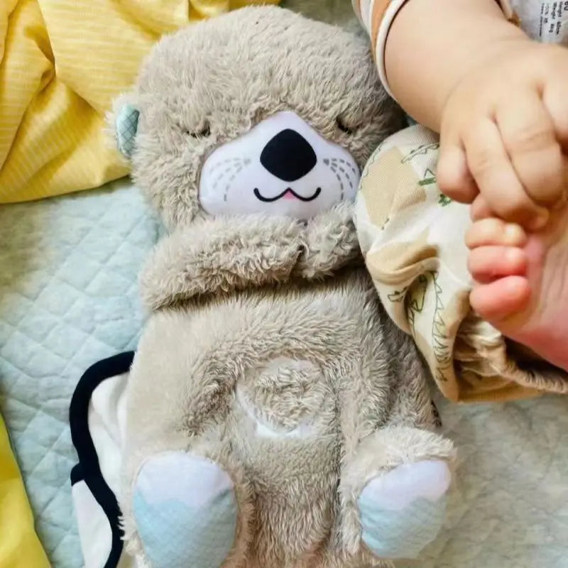 CuddleOtter™ Sleeping Companion